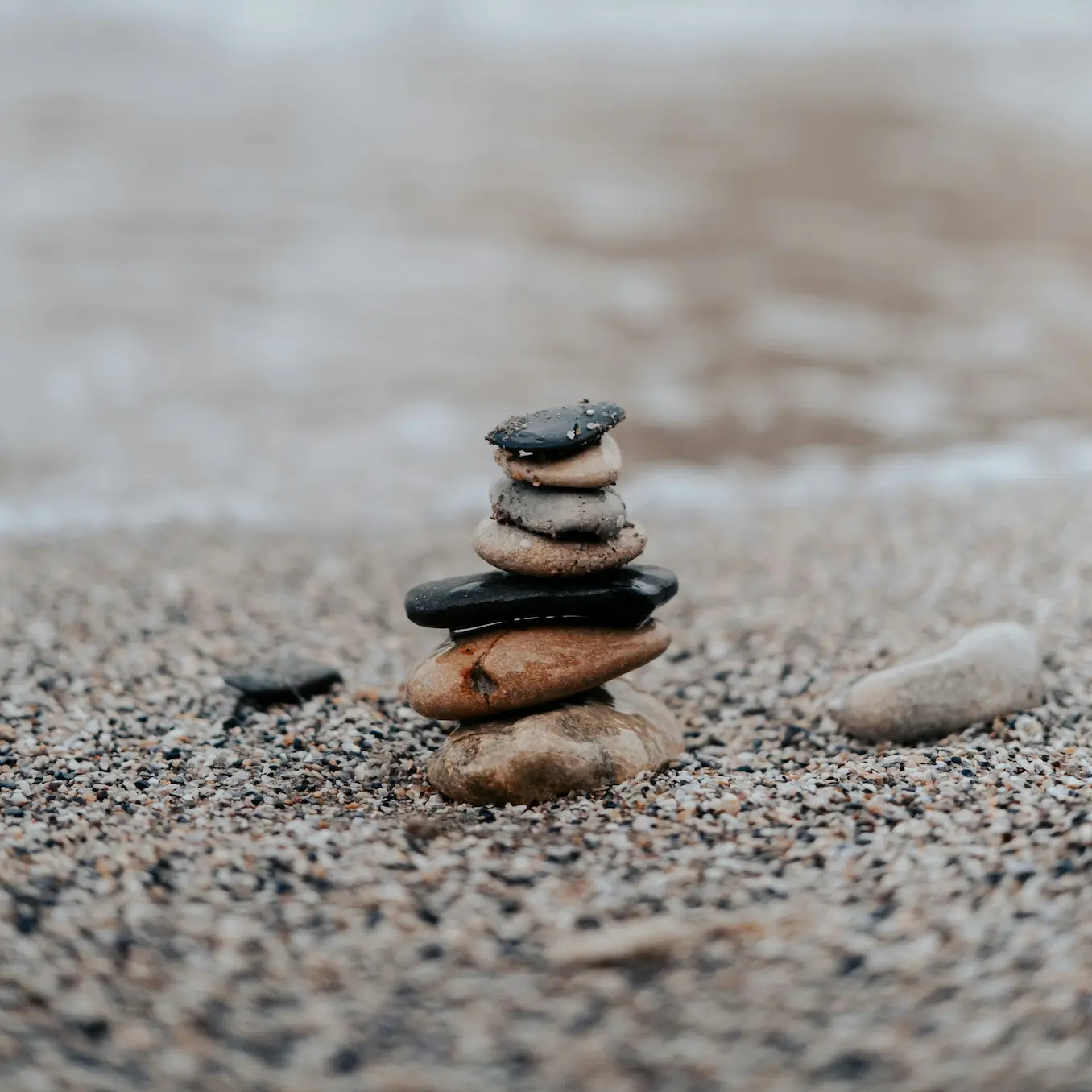 ahmed-qyh26GqY9yA-unsplash Stacked stones representing balance and natural healing